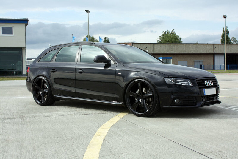 Black Audi Station Wagon — Neutral, Afternoon, Photograph, Building