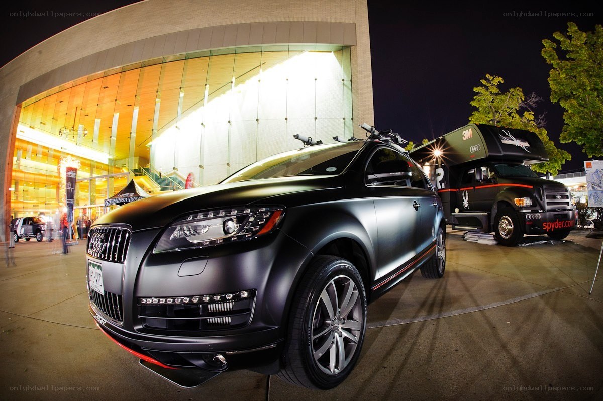 Black Audi SUV at night event