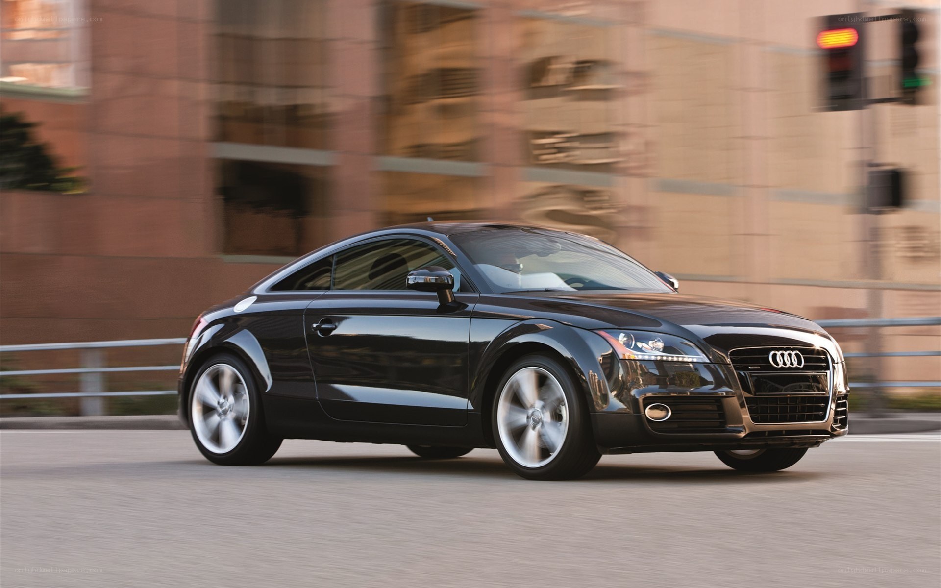 Black Audi TT in motion