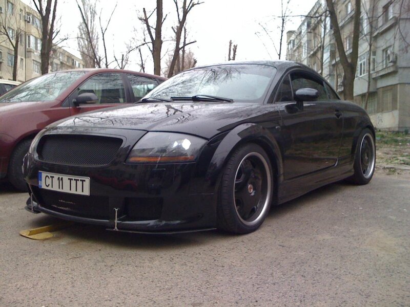 Black Audi TT parked on street