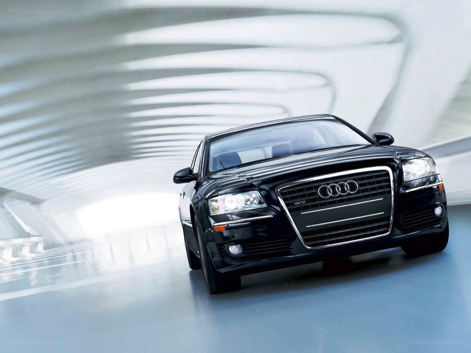 Black Audi W12 in motion