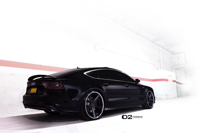 black audi with custom wheels