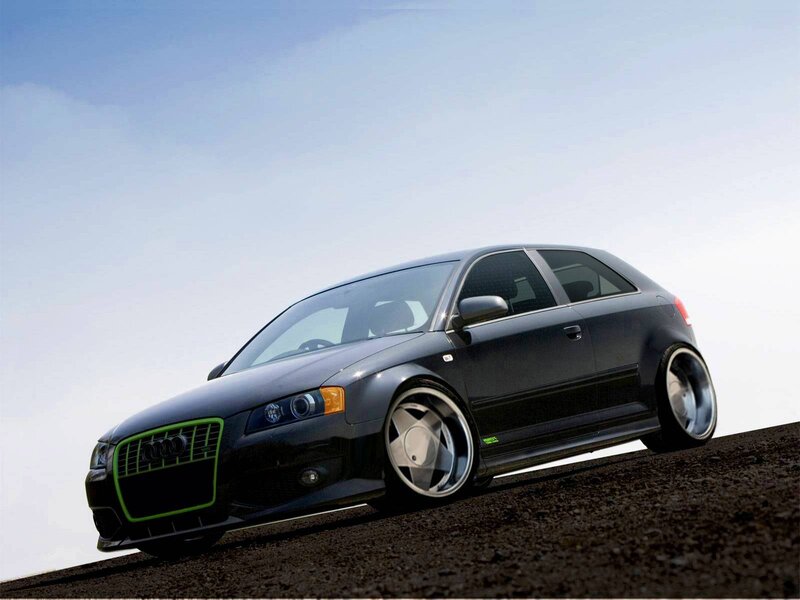 black audi with green accents
