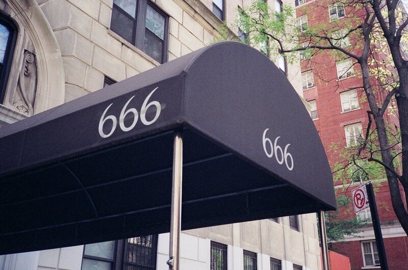 Black Awning with Numbers