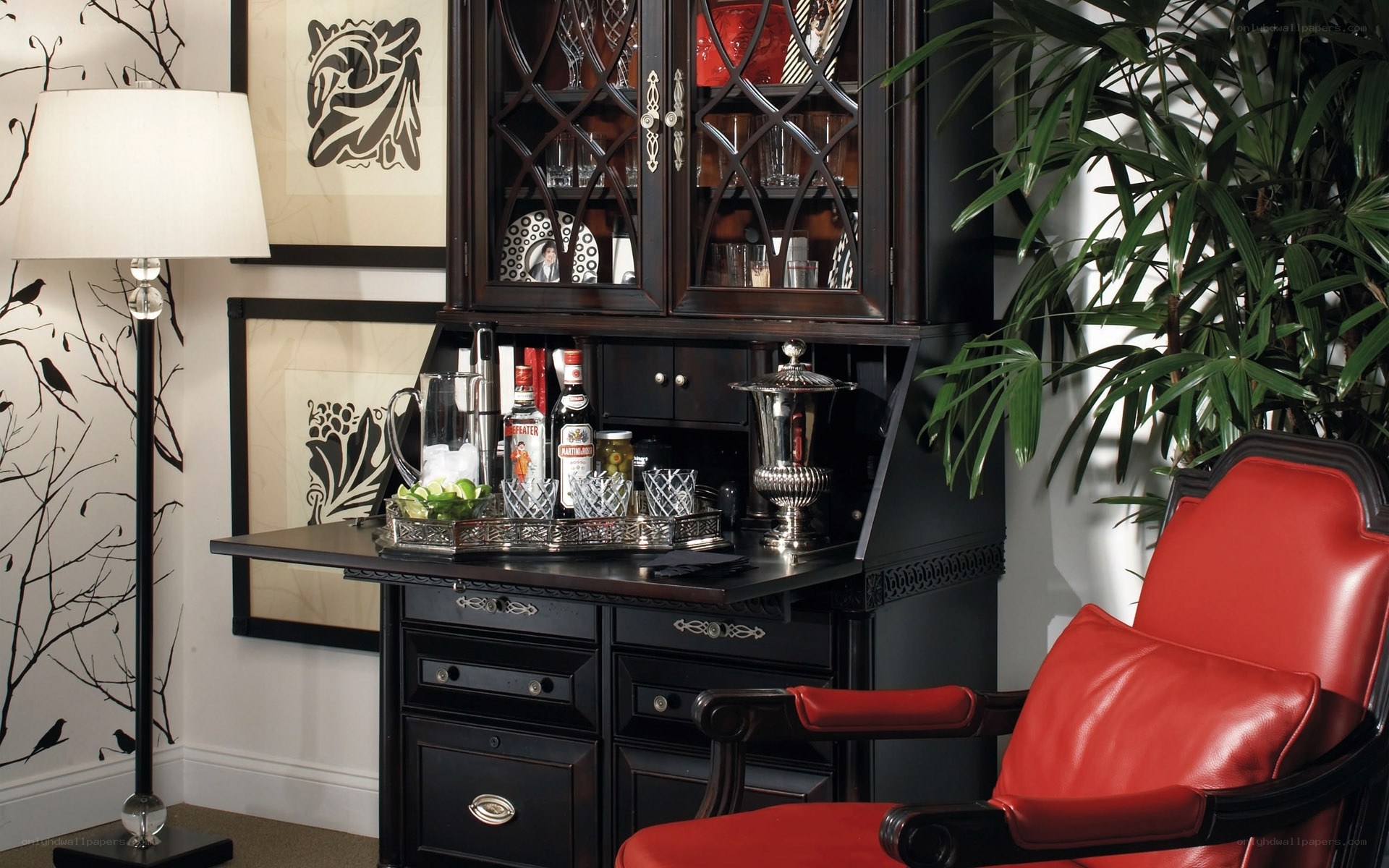 Black bar cabinet with red chair