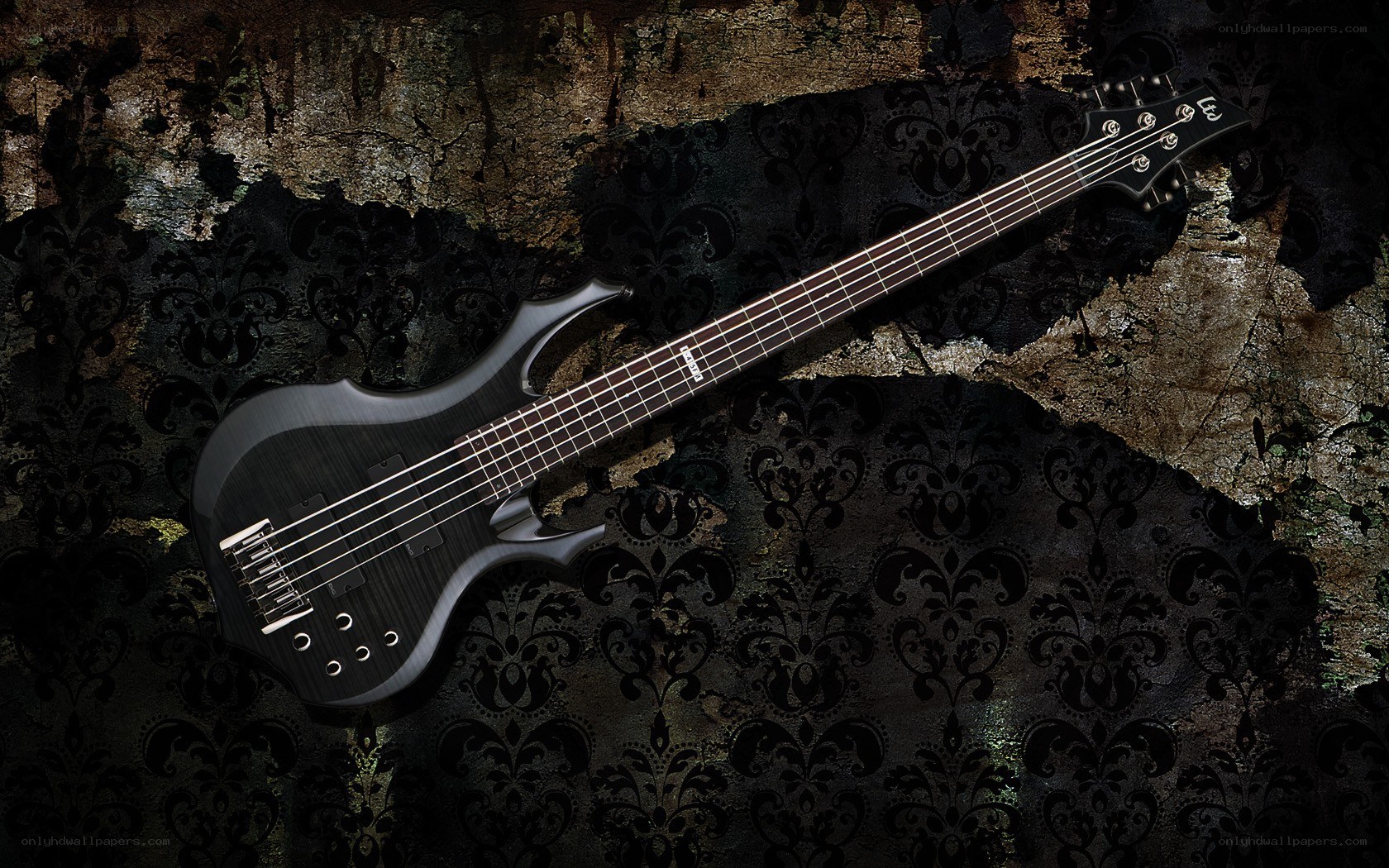 black bass guitar on textured background