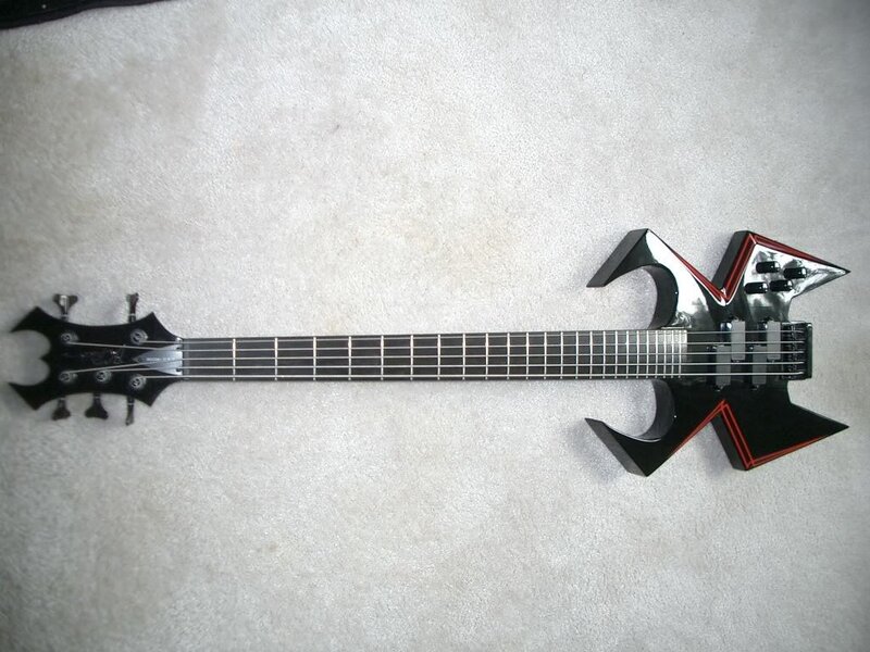 black bass guitar with star-shaped body
