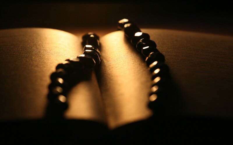 Black Beads on Book