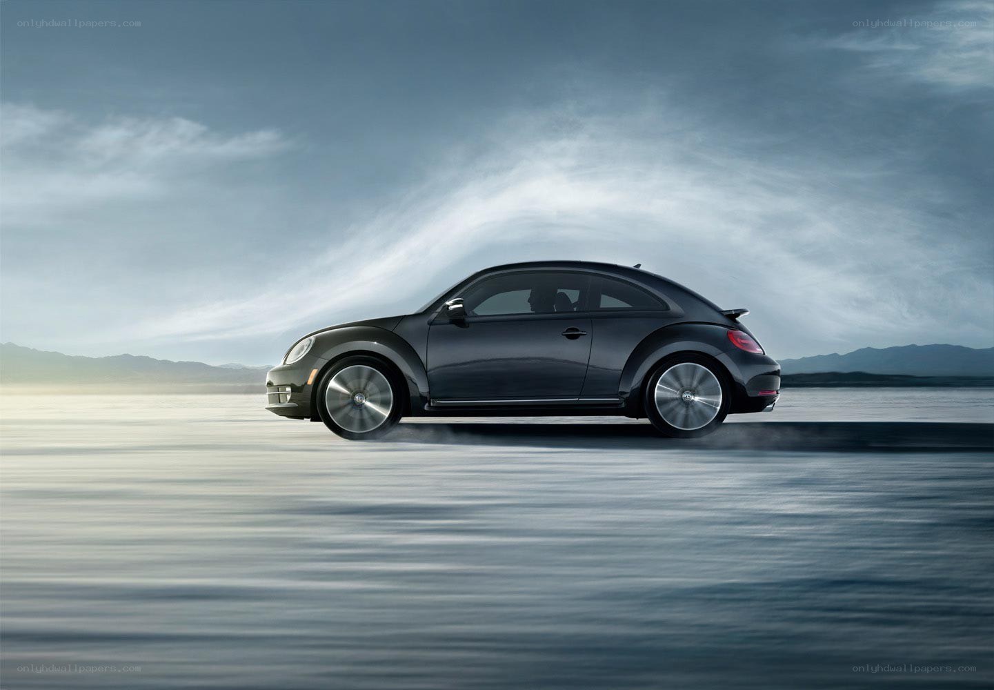 Black Beetle car in motion