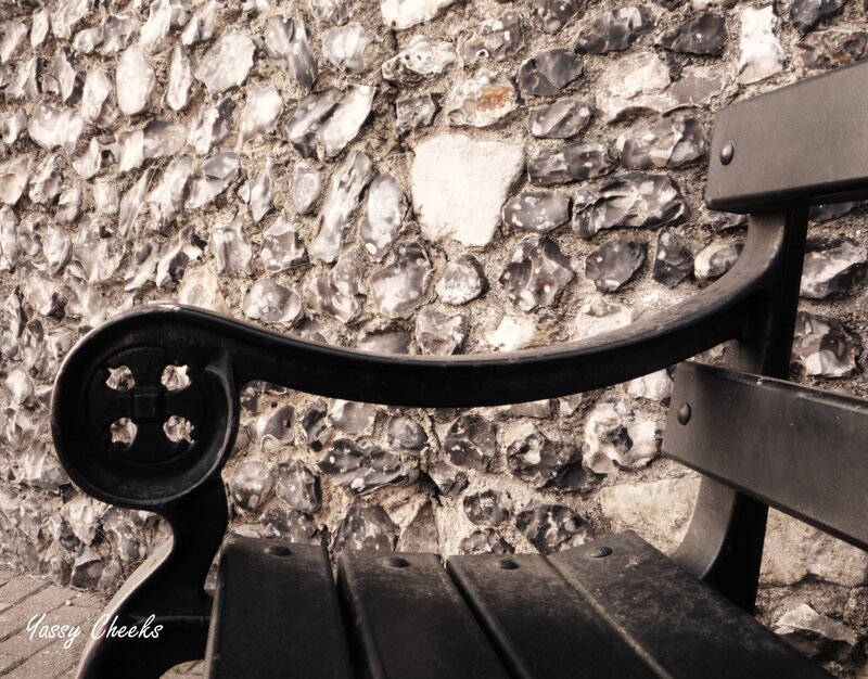 Black Bench Against Wall