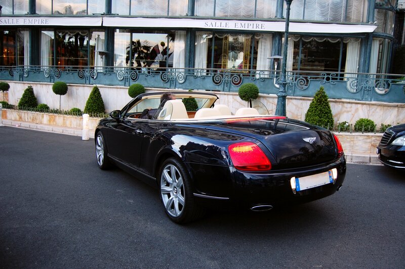 Black Bentley convertible on street