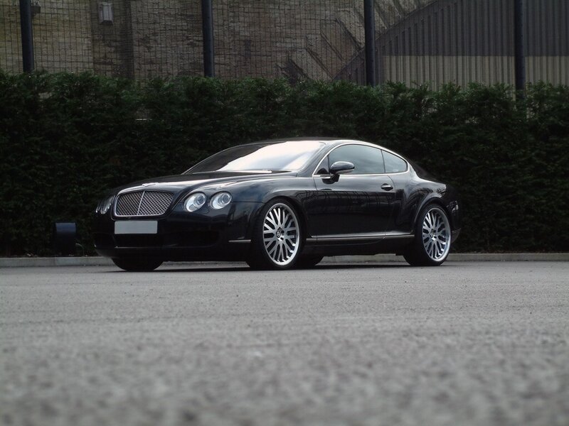 black bentley coupe parked