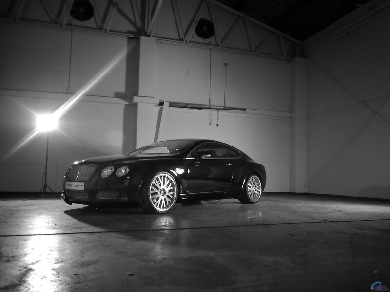 Black Bentley in a warehouse