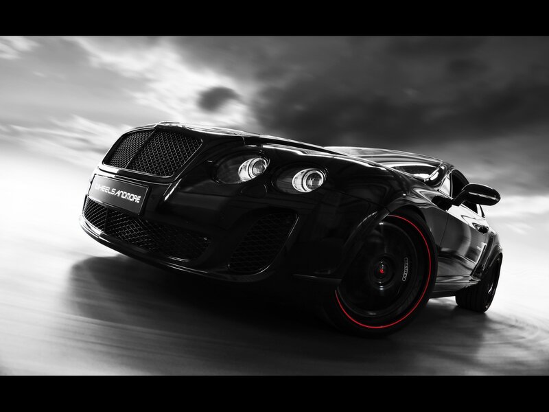 Black Bentley in motion