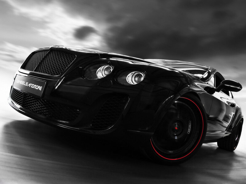 Black Bentley in motion