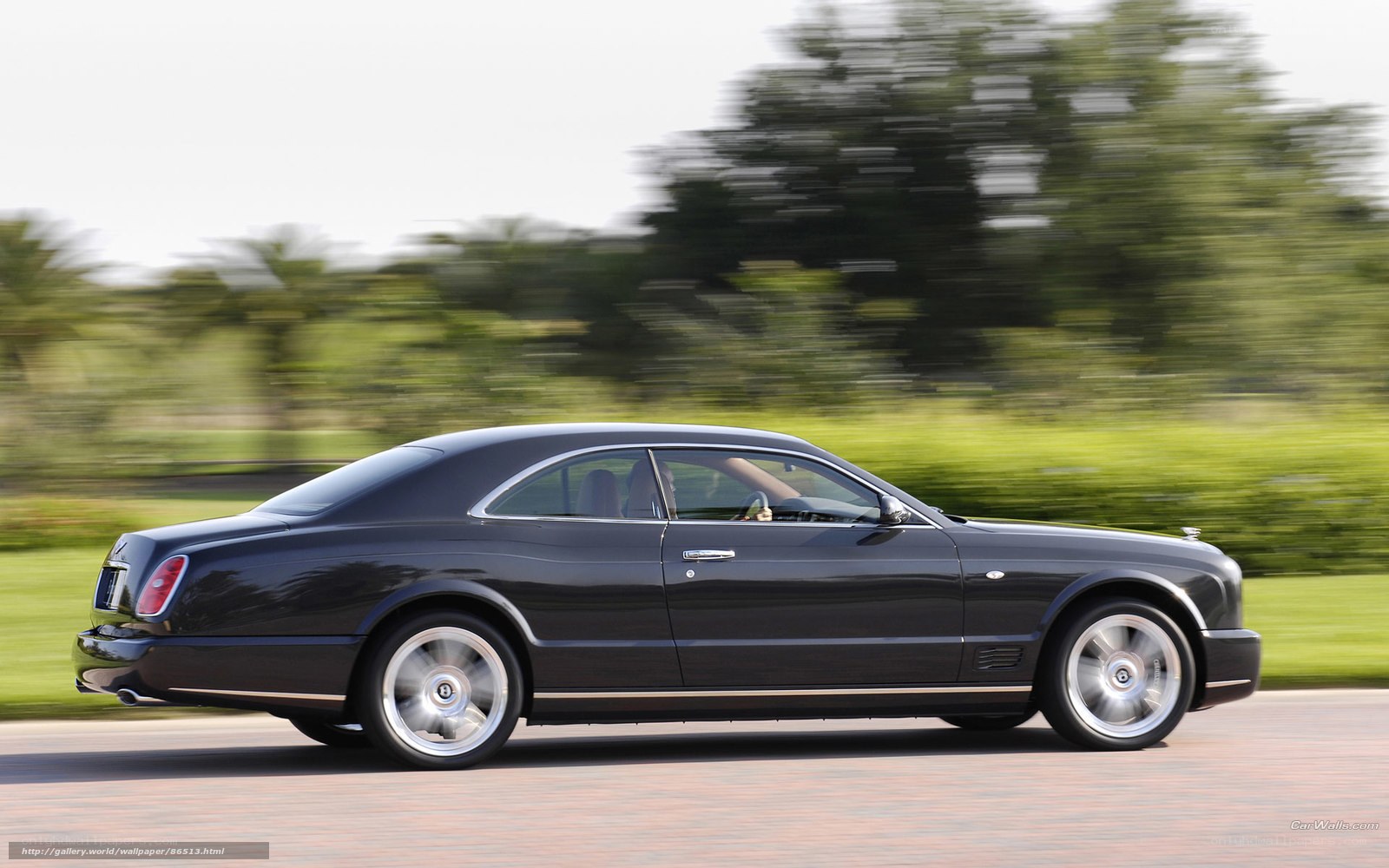 black bentley in motion