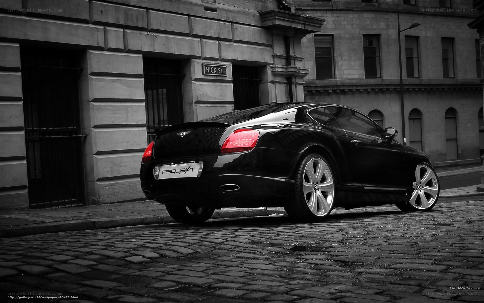 Black Bentley on cobblestone street