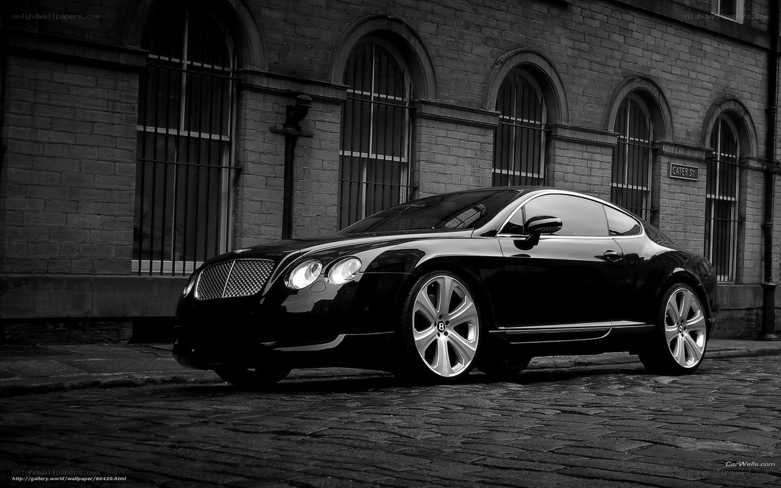 Black Bentley on cobblestone street