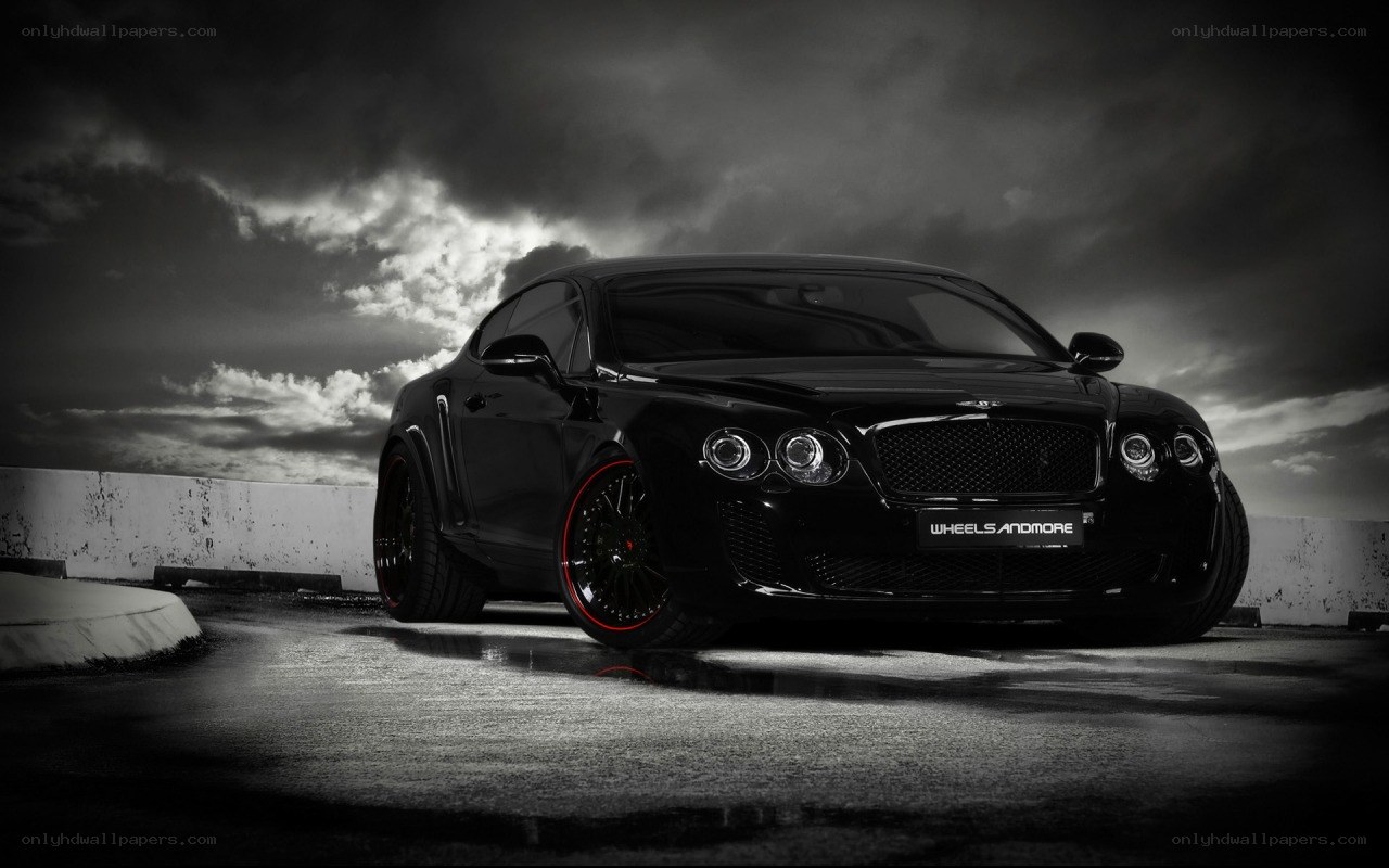 black bentley on wet pavement