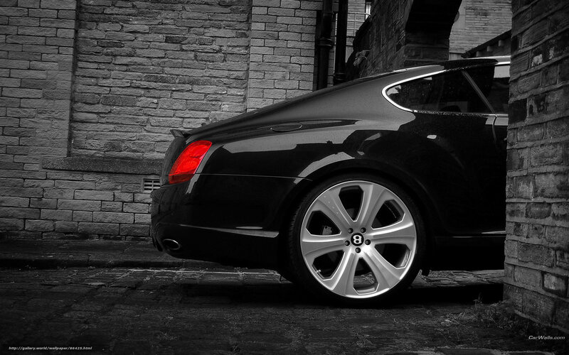 Black Bentley parked in alley