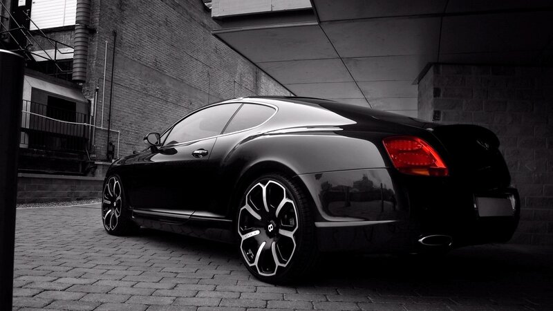 black bentley parked in alley