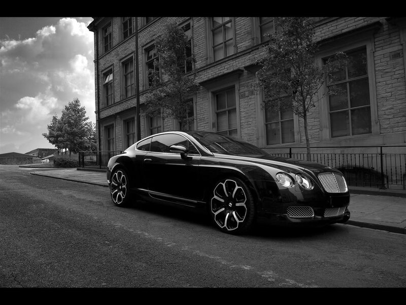 Black Bentley parked on street