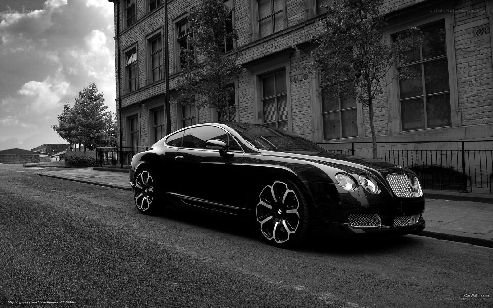 Black Bentley parked on street