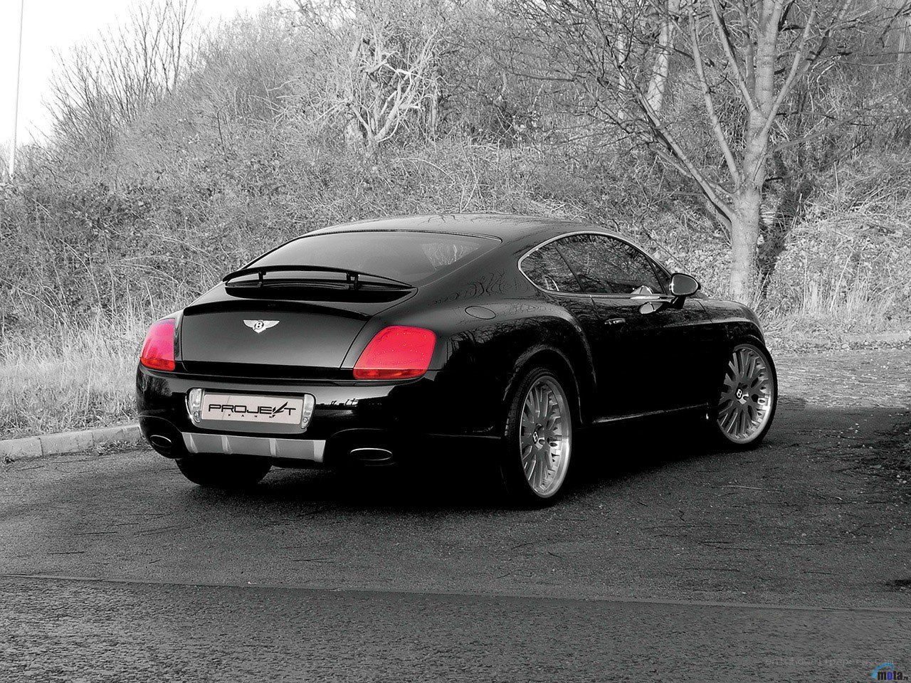 Black Bentley with custom rear wing