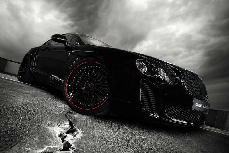 Black Bentley with red rims