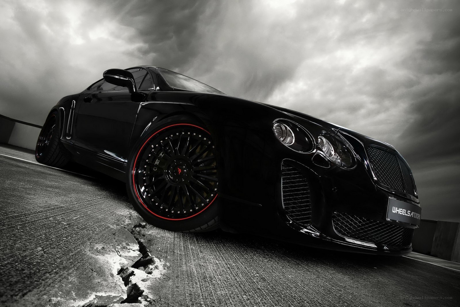 Black Bentley with red rims