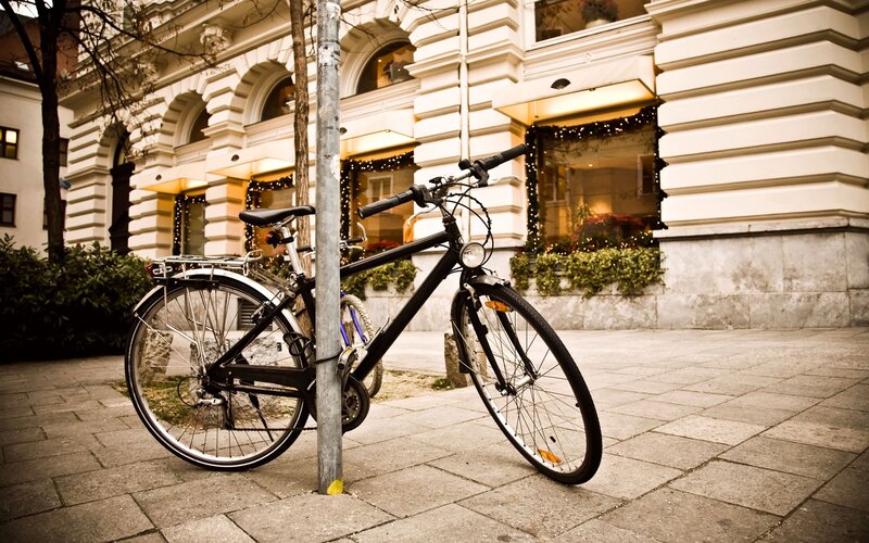 Black Bicycle on Sidewalk — Gray, Calm