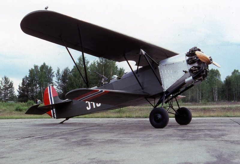Black Biplane on Tarmac