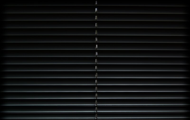 black blinds in dark room