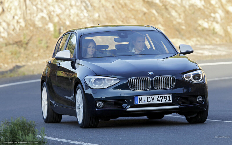 Black BMW 1 Series on road