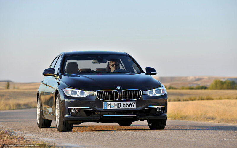 Black BMW 3 Series on country road
