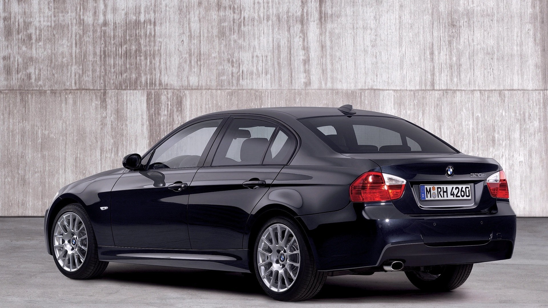 black bmw 320d sedan
