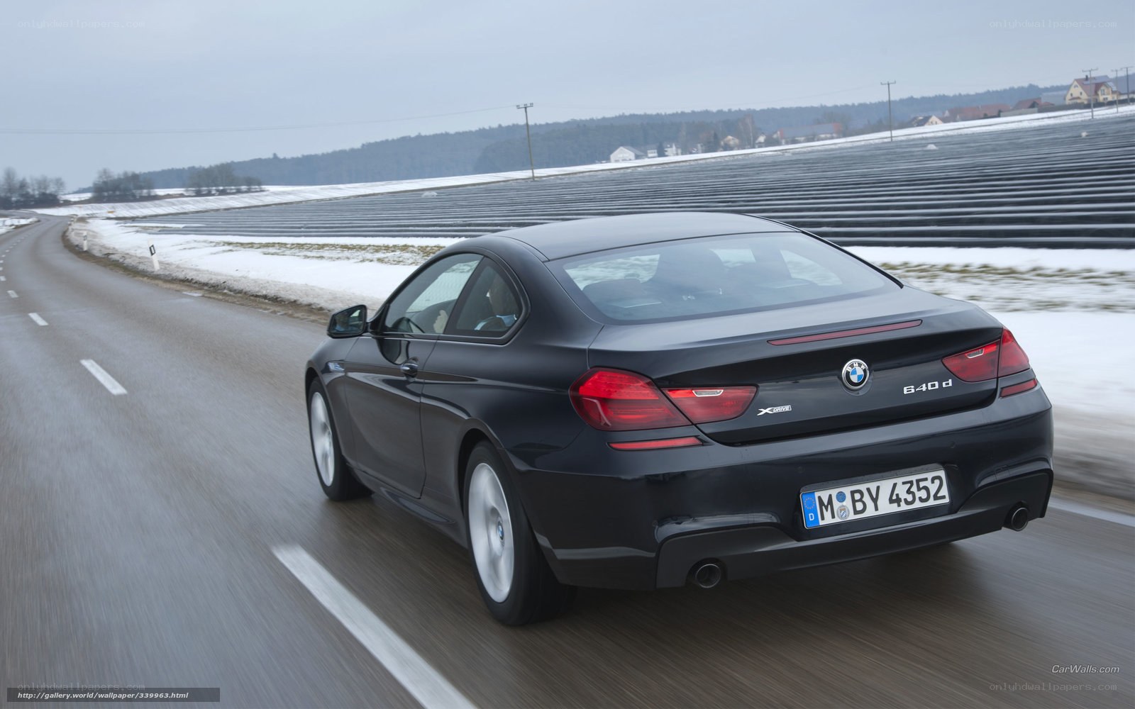 black bmw 640d xdrive driving