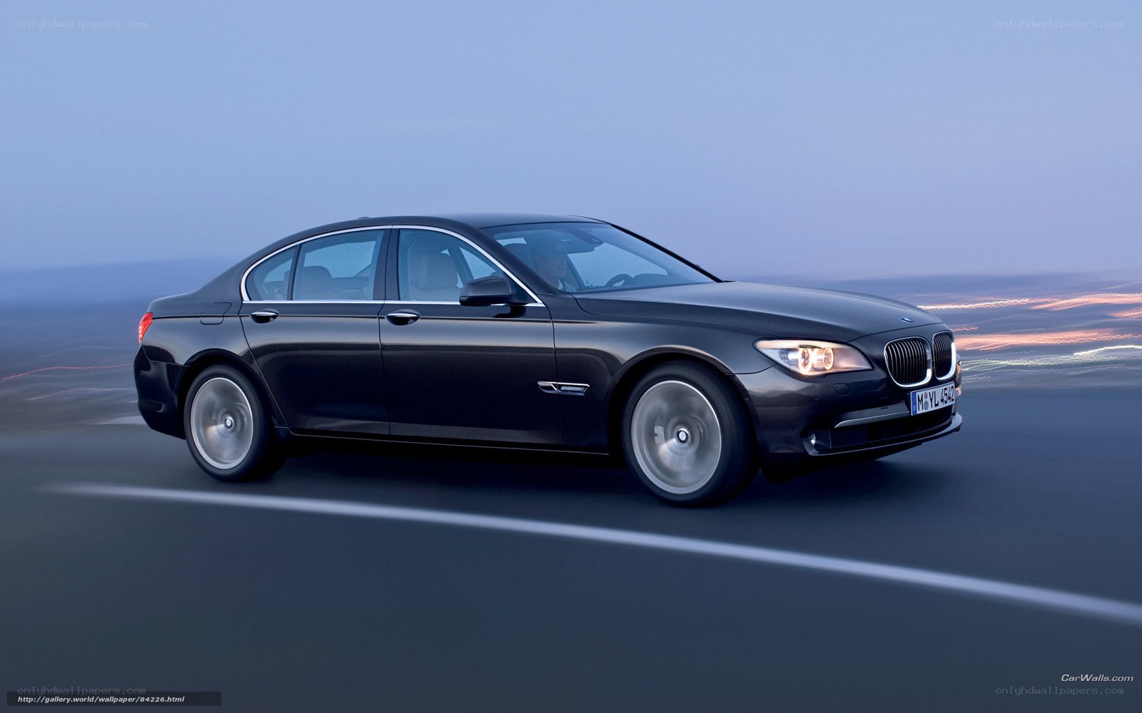 black bmw 7 series in motion