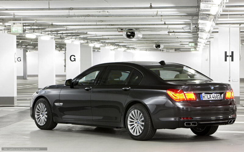 Black BMW 7 Series in parking garage