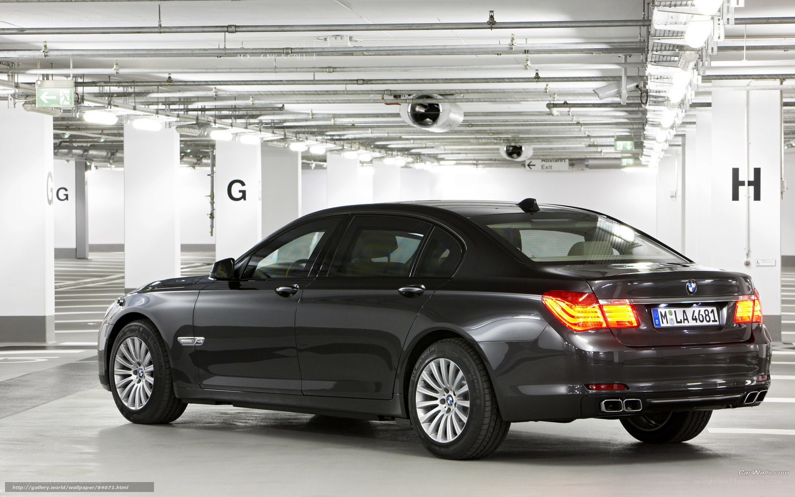 Black BMW 7 Series in parking garage