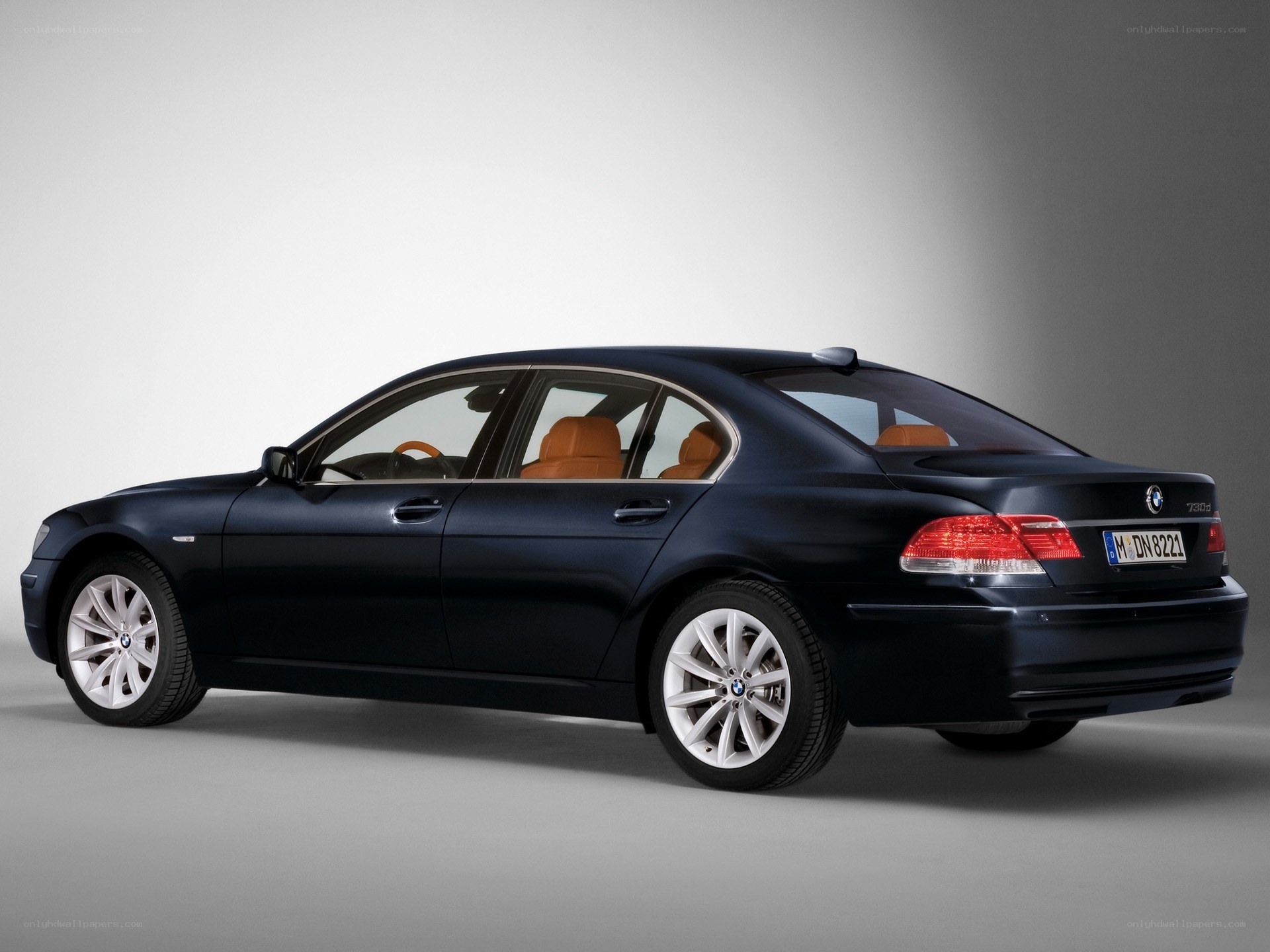 black bmw 730d sedan