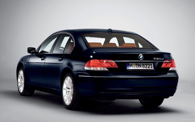 black bmw 730d sedan