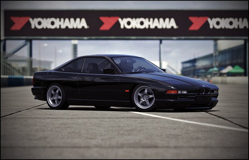 Black BMW 8 Series on a racetrack