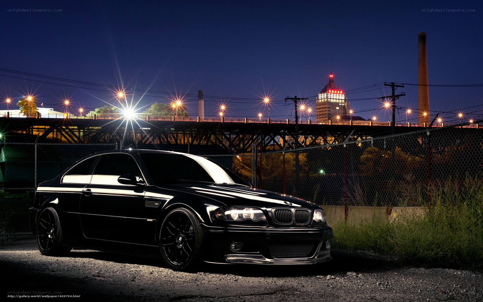 Black BMW at night in city