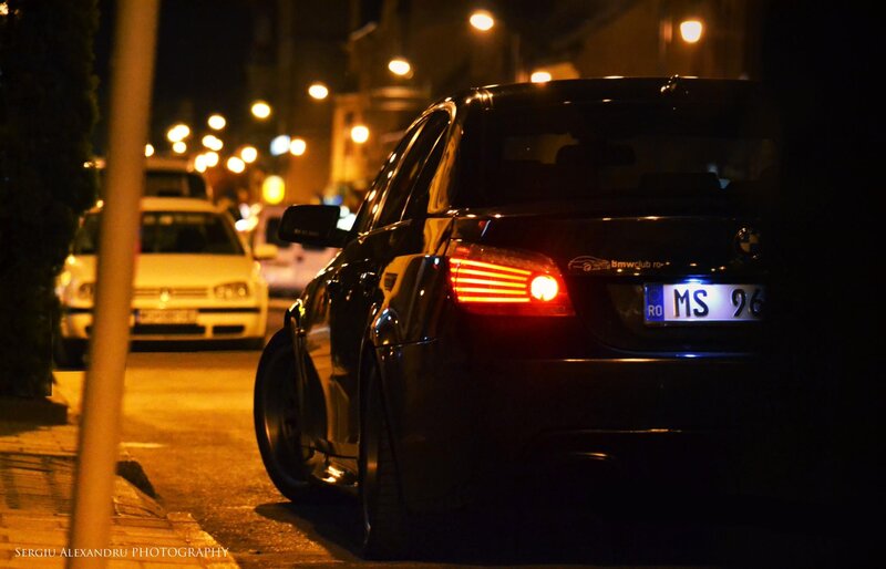Black BMW at night on street