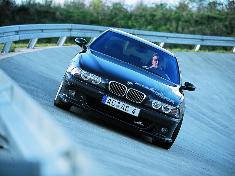 Black BMW Car — Blue, Dynamic, Afternoon