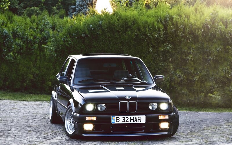 Black BMW Car — Dramatic, Sunset, Photograph, Hedge