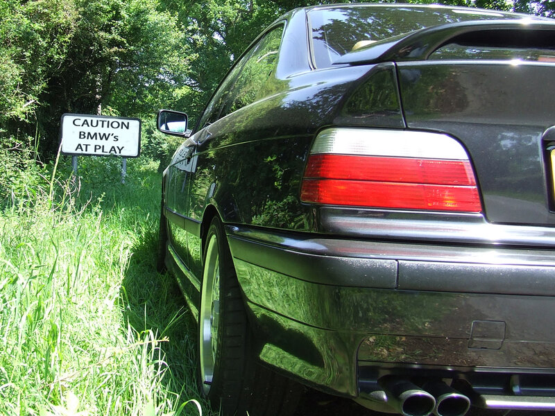 Black BMW Car — Green