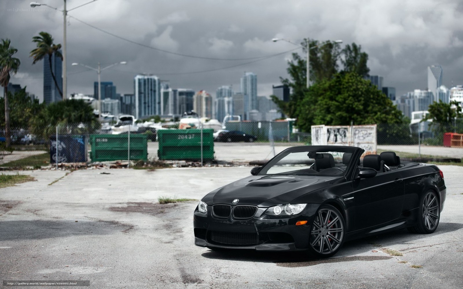 Black BMW convertible in city