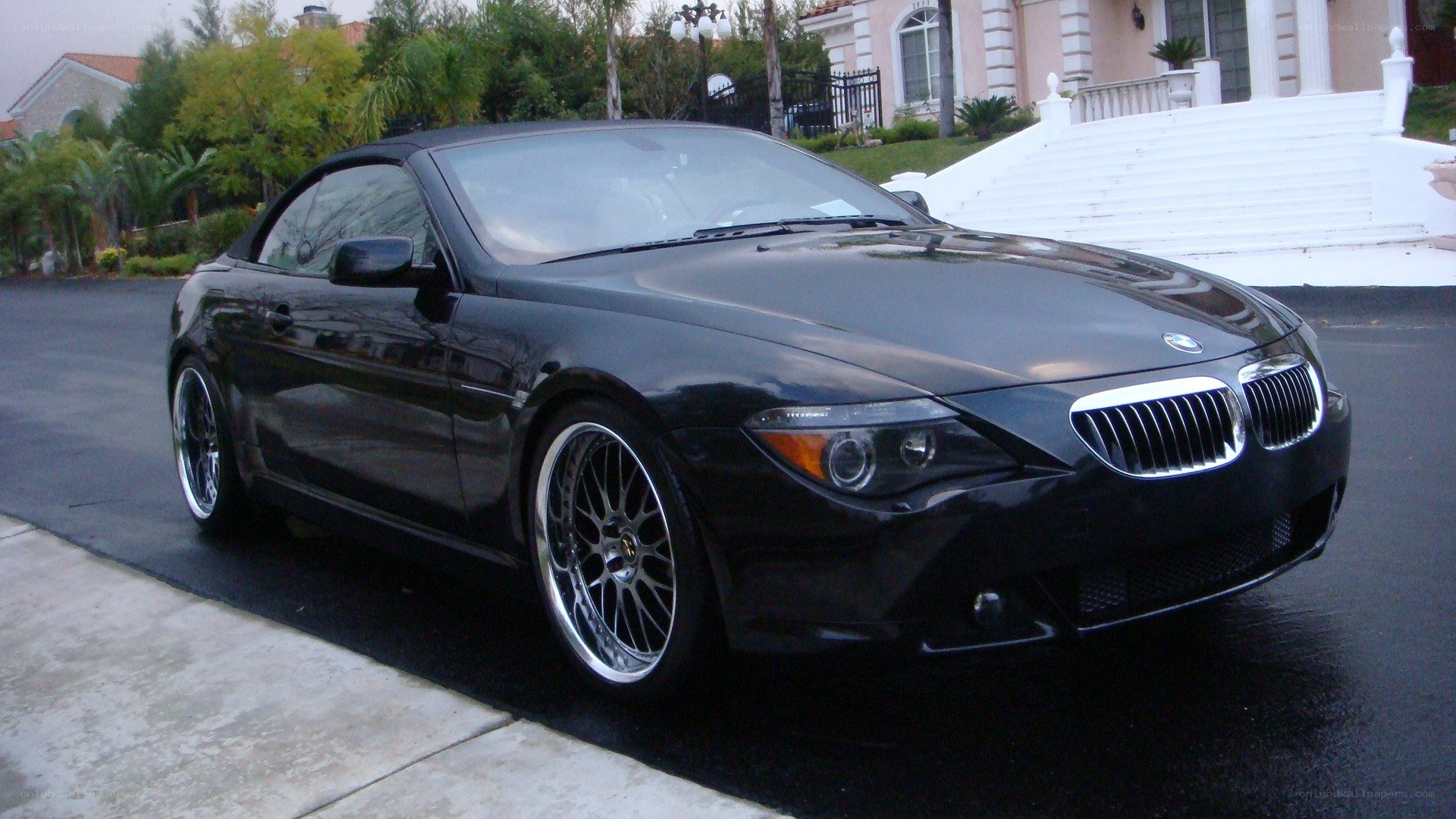 Black BMW convertible parked